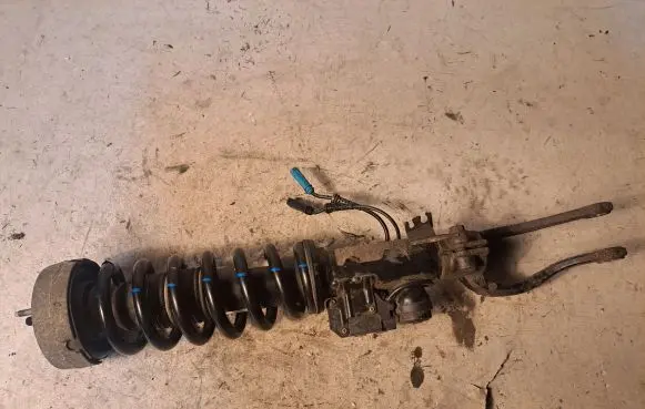 BMW X6 M Front shock absorber with coil spring