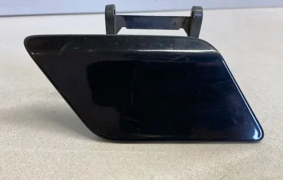 Headlight washer spray nozzle cap/cover