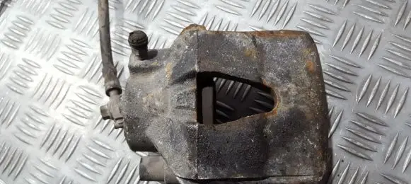 Volkswagen Golf V Front brake caliper