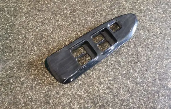 Mitsubishi Lancer Front door window switch trim MN124992K