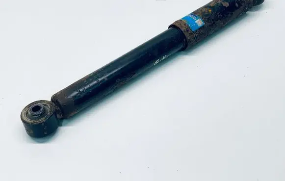 Volkswagen Caddy Rear shock absorber/damper 2K0513029M 313320