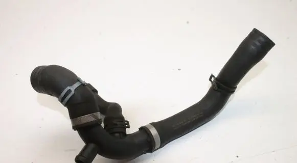 Volkswagen PASSAT B7 Engine coolant pipe/hose 1K0121087AH