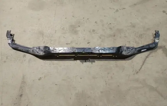 Radiator support slam panel