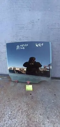 Nissan Almera Rear door window glass 1212123