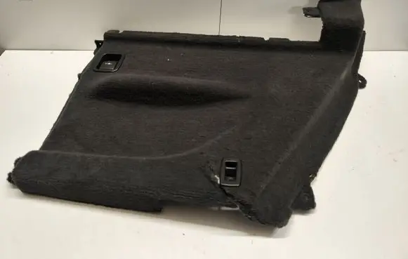 Trunk/boot lower side trim panel