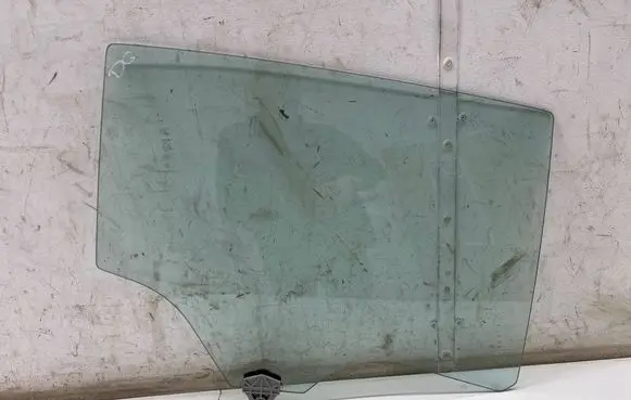Mazda 3 Rear door window glass 