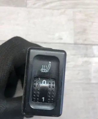 Seat heating switch