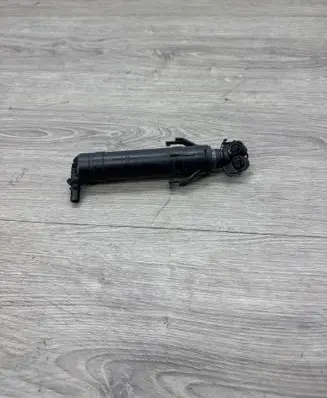 Volkswagen PASSAT B7 Headlight washer spray nozzle 3AA955104