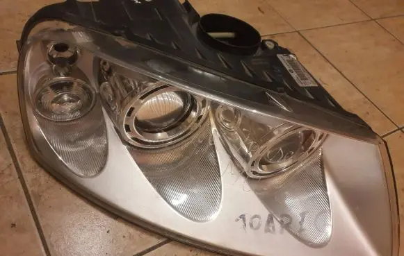 Volkswagen Touareg I Headlight/headlamp 7L6941016BK 89307861