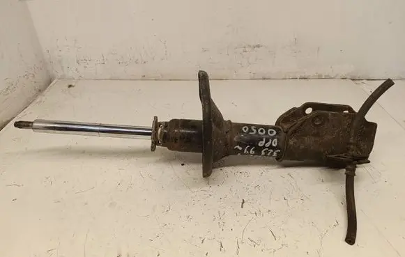 Mazda 323 F Front shock absorber/damper