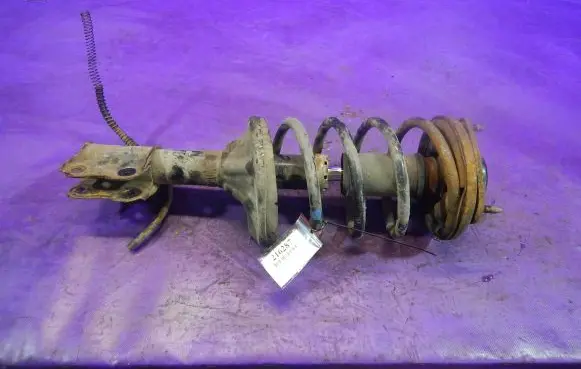 Mitsubishi Lancer Front shock absorber with coil spring