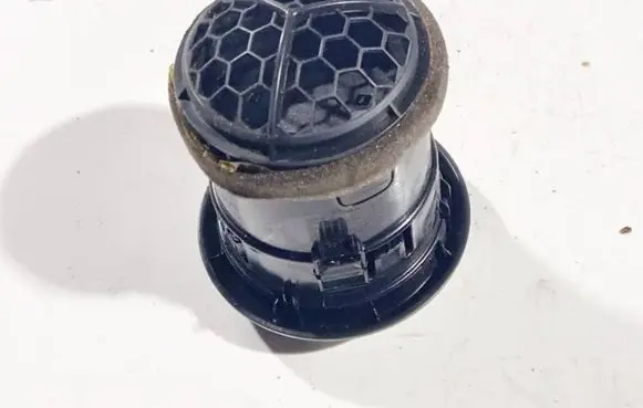Nissan Note (E11) Dash center air vent grill
