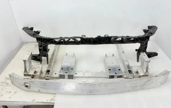 Top upper radiator support slam panel