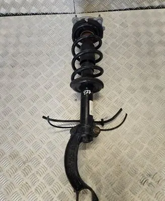 Front shock absorber with coil spring