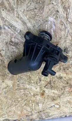 Thermostat/thermostat housing