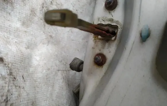 Mazda 626 Front door check strap stopper 