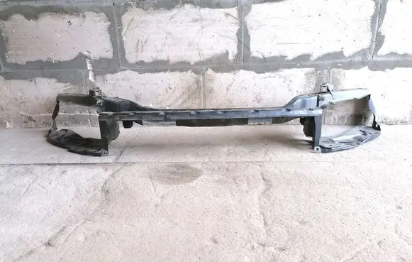 Top upper radiator support slam panel