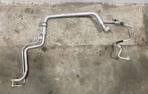 Dodge RAM Air conditioning (A/C) pipe/hose 68105177AD