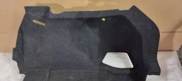 Trunk/boot lower side trim panel