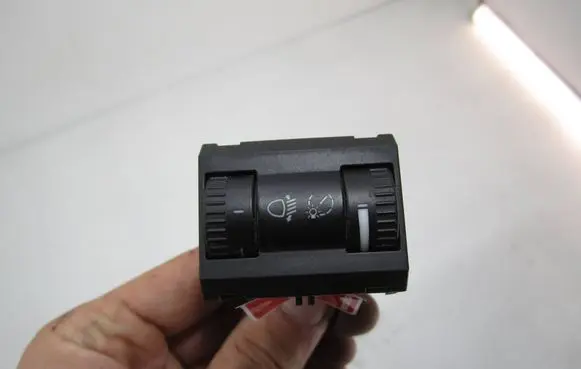 Panel lighting control switch