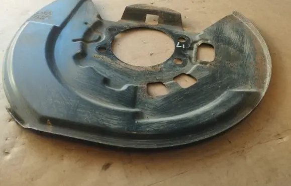Infiniti G37 Front brake disc dust cover plate 