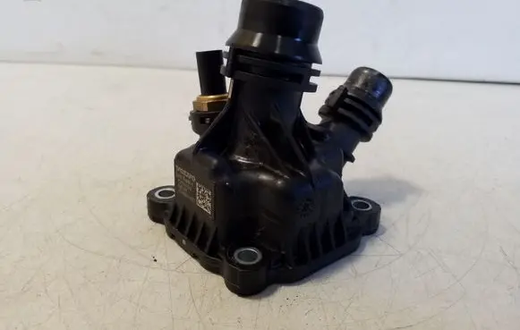 Thermostat/thermostat housing