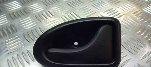 Dacia Logan I Rear door interior handle trim 7700830079