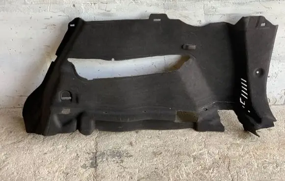 Trunk/boot lower side trim panel