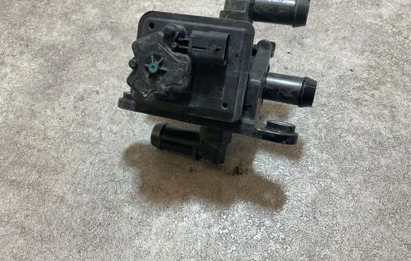 Coolant heater control valve