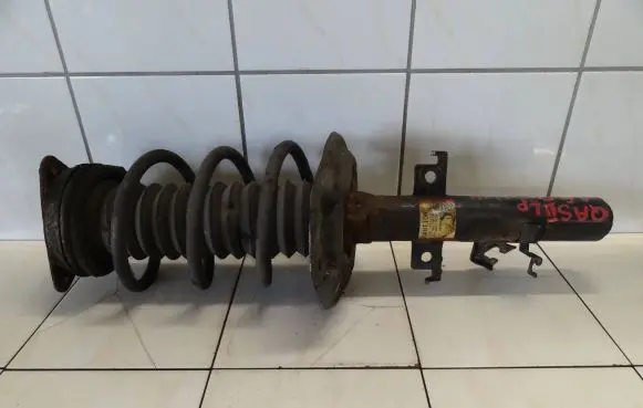 Nissan Qashqai Front shock absorber with coil spring