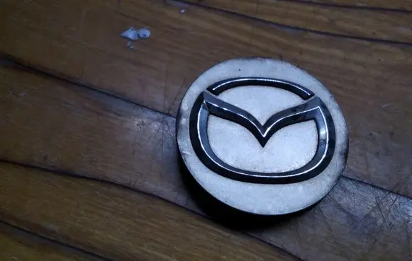 Mazda 626 Non-original wheel cap 2477 F2512