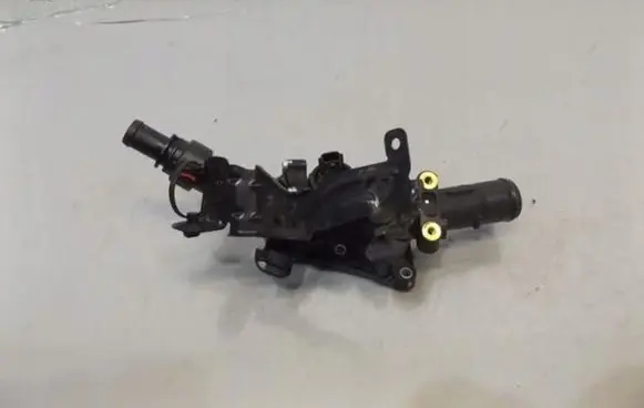 Thermostat/thermostat housing