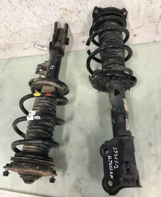 Hyundai Tucson IV NX4 Front shock absorber with coil spring 54650n7000