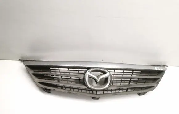 Mazda 626 Front bumper upper radiator grill GG2M50712