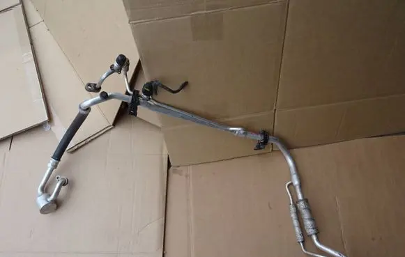 Hyundai Tucson IV NX4 Air conditioning (A/C) pipe/hose 97775N7011