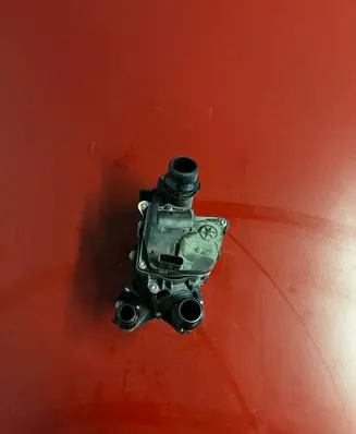 Thermostat/thermostat housing