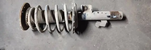 Front shock absorber with coil spring