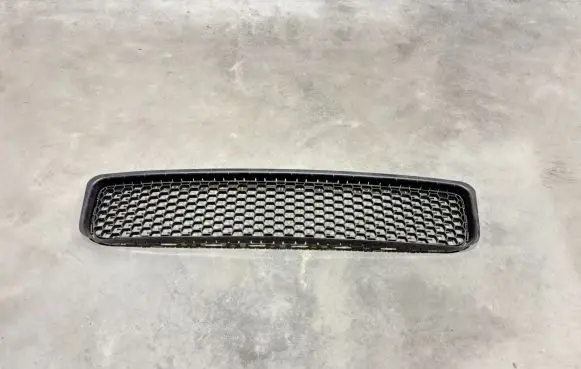 Volkswagen Touareg I Front bumper lower grill 7L6853678D