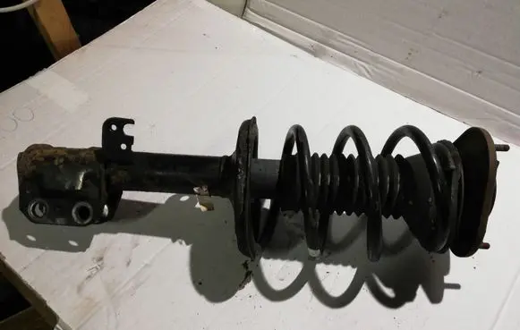 Toyota Avensis T250 Front shock absorber with coil spring
