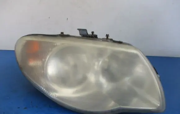 Chrysler Grand Voyager IV Headlight/headlamp 04857830AB