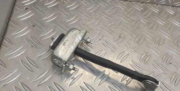 Front door check strap stopper