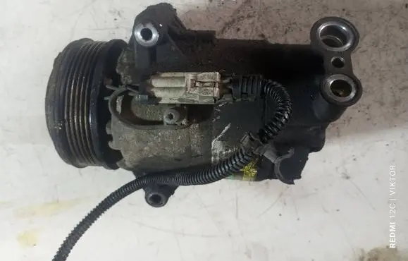 Opel Zafira B Air conditioning (A/C) compressor (pump) 13124752