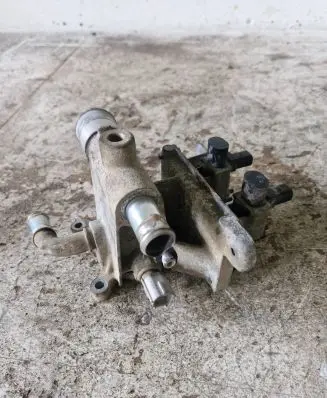 Thermostat/thermostat housing
