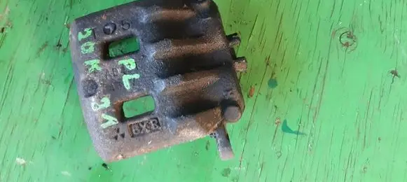 Subaru Forester SF Front brake caliper