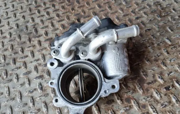 Volkswagen Tiguan Throttle valve 04L128059AA 04L128063AA