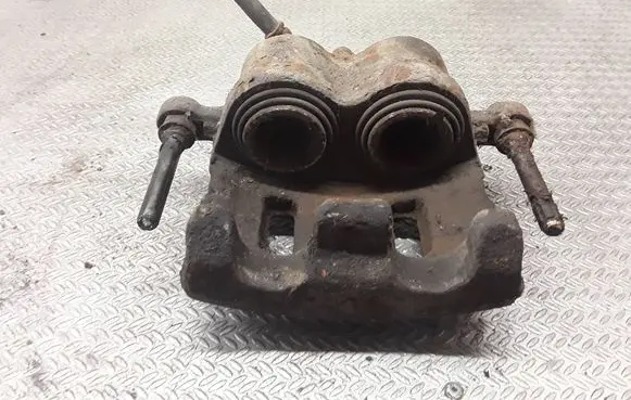 KIA Opirus Front brake caliper 