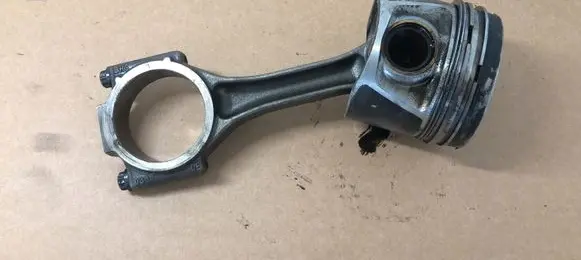 Piston with connecting rod