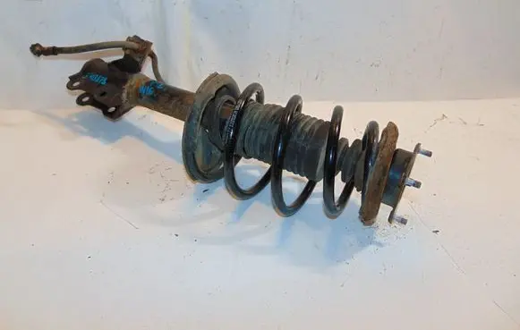 Nissan Almera N16 Front shock absorber with coil spring E4303BM425 54010BM402