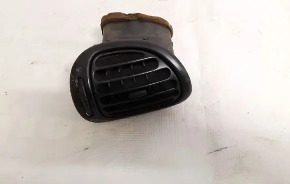 Dash center air vent grill