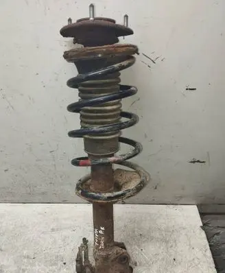 Toyota Yaris Front shock absorber with coil spring